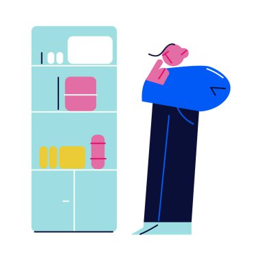 Genç adam ayakta duruyor ve eczanede uyuşturucu seçiyor.