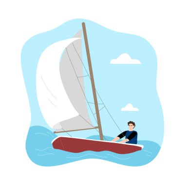 Genç adam yelkenlide oturuyor ve beyaz yelkenli altında gezinin tadını çıkarıyor.