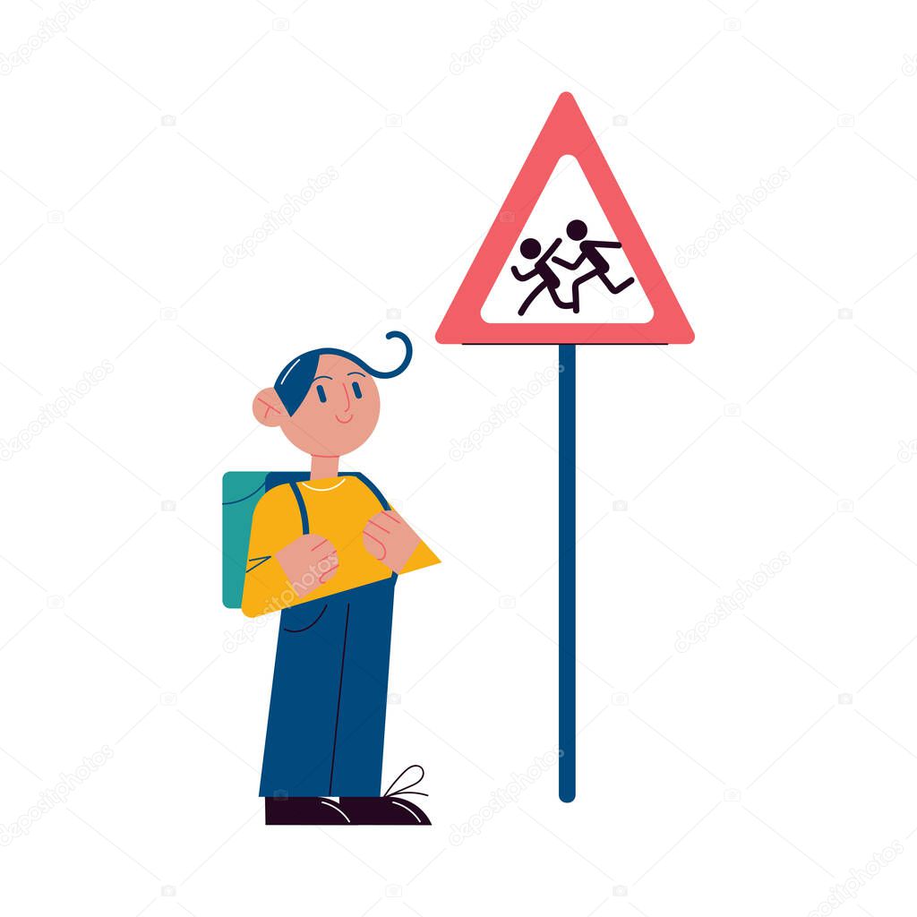 Boy looking at warning sign about children near school and memorizing traffic rule