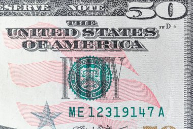 50 dolarlık banknotun parçası.