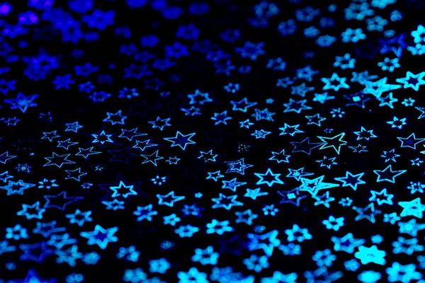 青いホログラフィック星の抽象的な背景 — ストック写真
