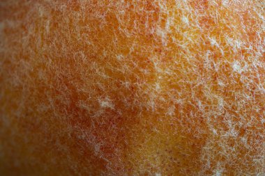 Olgun şeftalinin dokusuna yakın çekim.