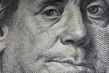 100 Dolarlık banknotta Franklin 'in Gözlerinin Macro Çekimi