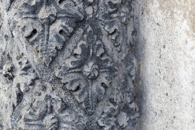 Ancient Stone Carving with Floral Patterns