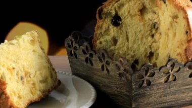 Ahşap masa, ışıkları yanıp sönen arka plan üzerinde panettone yakın çekim