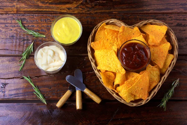 Nachos Corn Chips Sauces Placed Basket Heart Shape Wooden Table — Stock Photo, Image