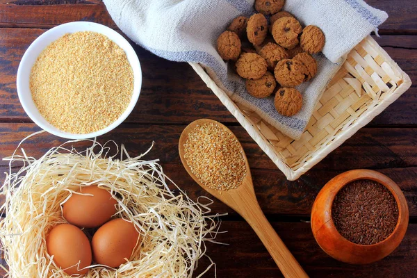 homemade gluten free and lactose free cookies on rustic wooden table with ingredients