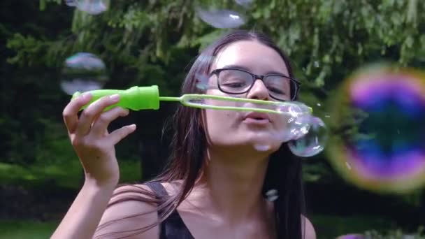 Teenage Girl Blowing Soap Bubbles Having Fun Summer Time Hand — Stock Video