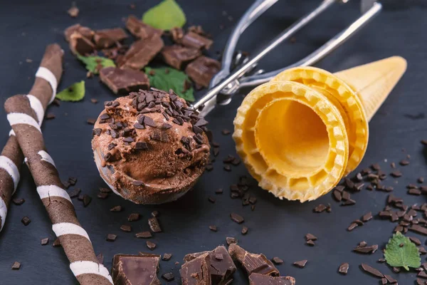Chocolate ice cream in scoop with cone — Stock Photo, Image
