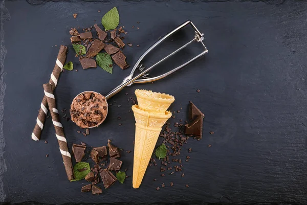 Chocolate ice cream in scoop with cone — Stock Photo, Image