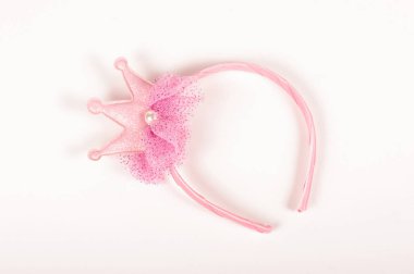 Pink princess headband on the white background for girls whose like role playing games clipart