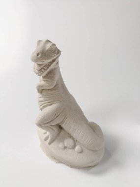 T-Rex dinozor model beyaz arka plan üzerinde izole jips (alçı) üzerinden kalıplanmış