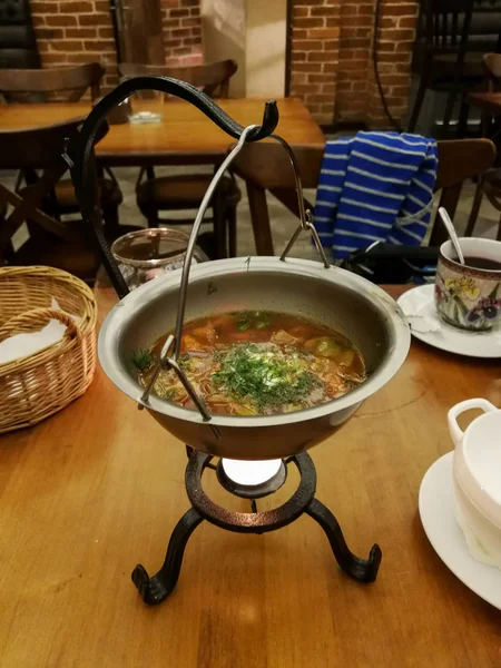 Tasty Vegetable Soup Served Metal Pot Candle Luxury Restaurant Table — Stock Photo, Image