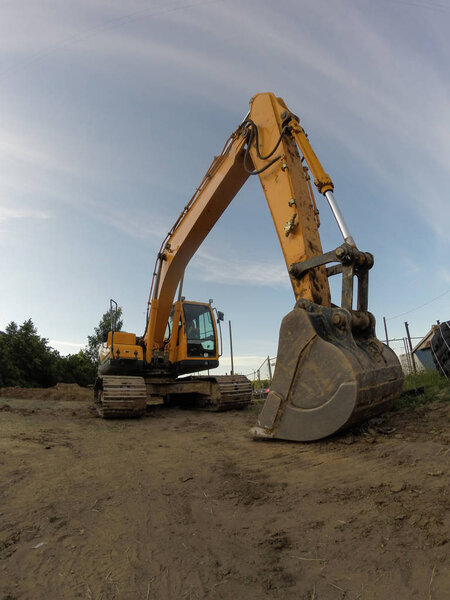 Industrial excavator for ground works in outdoors construction site