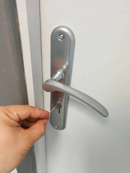 Small metal wire inserted in the keyhole of the door for unlocking doors without key