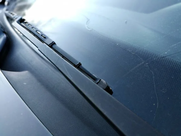 Windscreen glass crack in vehicle front glass close up