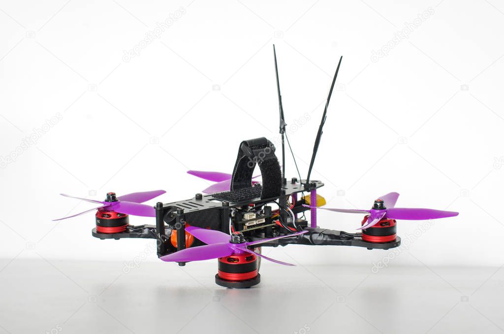 Small size racing drones isolated on the white background