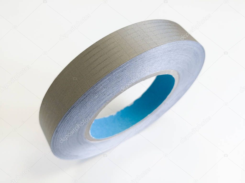 Conductive shielding textile tape for reducing electromagnetic emissions EMI isolated on the white background