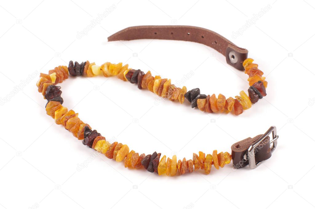 Raw amber beads collar for pets as tick repellent isolated on the white background