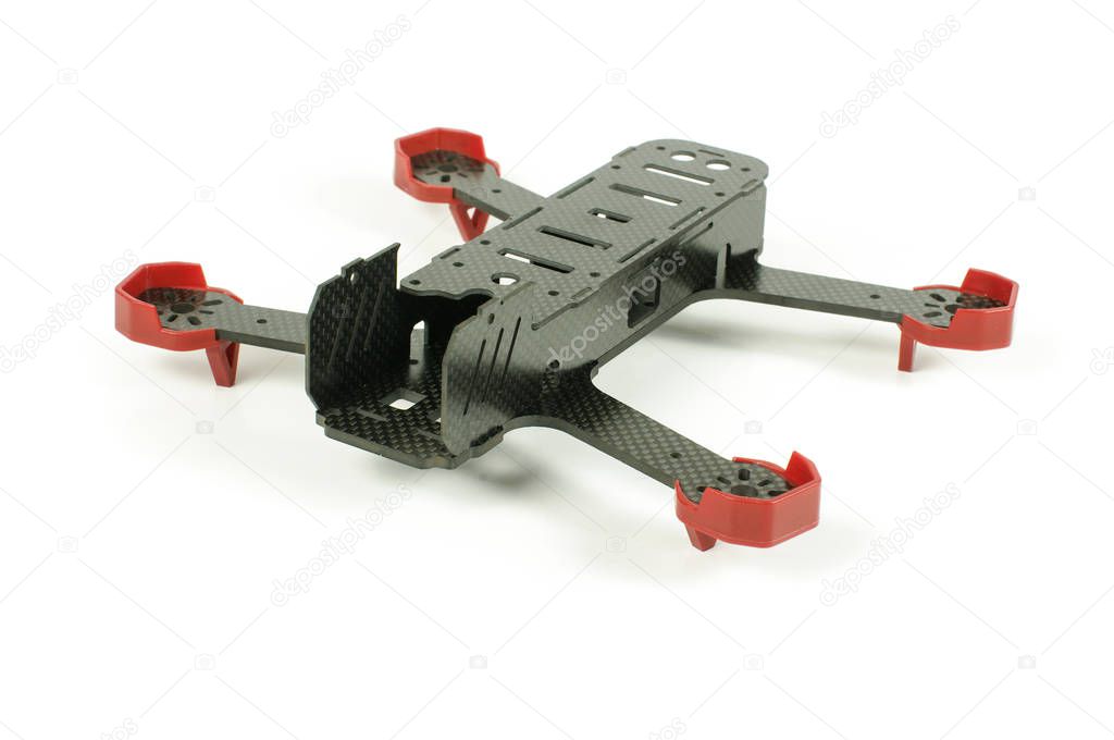Beginning of racing drone assembly. Durable frame of drone made from carbon fiber