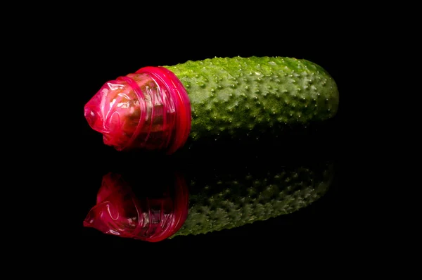 Pink Condom Big Green Cucumber Concept Sexual Education — Stock Photo, Image