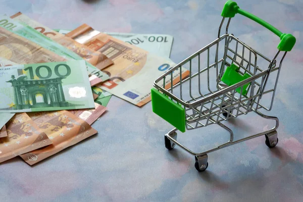 Close Miniature Shopping Cart Bill Paper Currencies Royalty Free Stock Photos