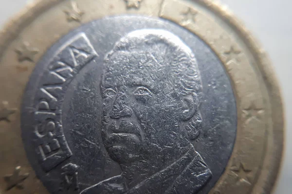 Spanish one euro coin closeup. Coin is from 1999 and shows Juan Carlos I.
