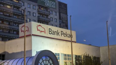 Rzeszow Poland - September 9 2025: Bank Pekao signage is prominently displayed on the building illuminating the evening ambiance with its recognizable logo.