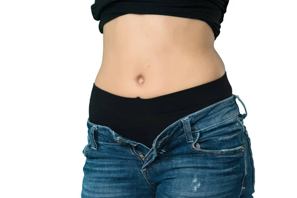 Beskuren Bild Unfastening Jeans Fashionabla Flicka Isolerad Vit Stockfoto