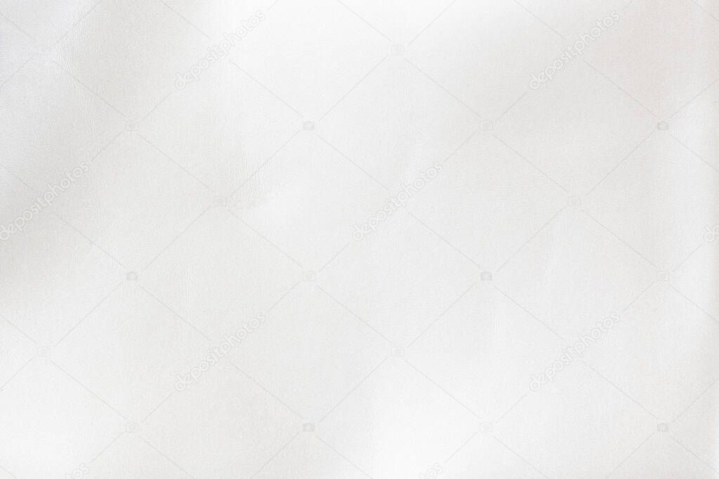 Closeup textured white leather background, small grain