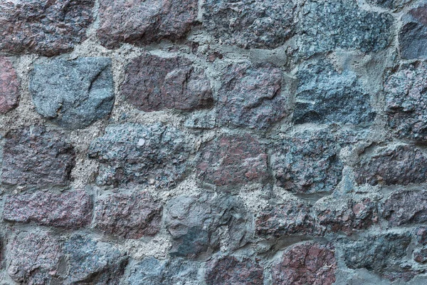 Grey medieval stone wall texture background. horizontal