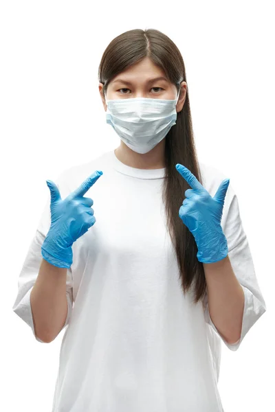 Young Asian Girl Medical Mask Blue Gloves Pointing Protection White — Stock Photo, Image