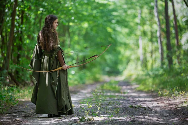Elf archer from behind in the woods — Stock Photo, Image
