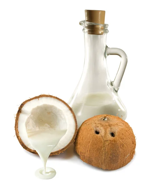 Kokosové mléko a kokosové ořechy — Stock fotografie