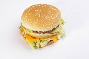 Burger tam yüz sebze, baharatlar ve patates kızartması. Eti hamburger. Hamburger bıçakla. Sığır eti hamburger. Organik hamburger