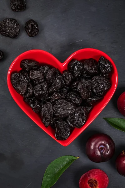 Dried Plums Pitted Prunes Heart Shaped Bowl Background Selective Focus — Stock Photo, Image