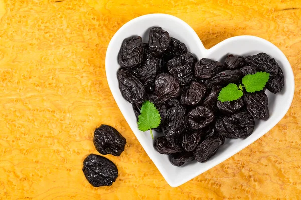 Dried Plums Pitted Prunes Heart Shaped Bowl Selective Focus — Stock Photo, Image