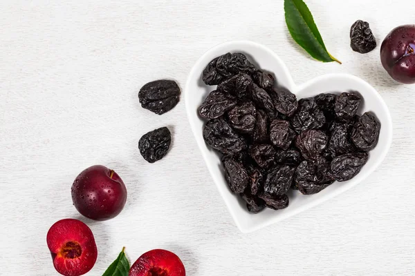Dried Plums Pitted Prunes Heart Shaped Bowl Selective Focus — Stock Photo, Image