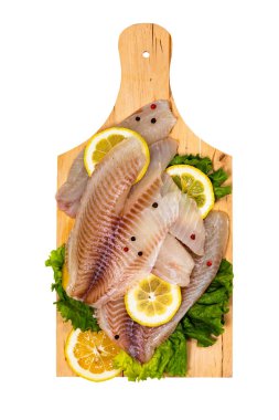 Beyaz Balık Tilapia Çiğ Fileto Beyaz Arkaplanda İzole Edildi. Seçici odak.