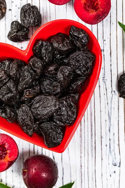 Dried Plums Pitted Prunes Heart Shaped Bowl Background Selective Focus — Stock Photo, Image