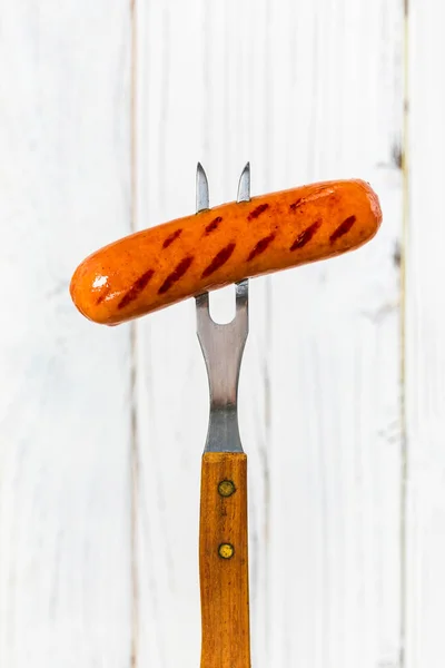 Grilled Sausages Fork Wooden Background Selective Focus — Stock Photo, Image