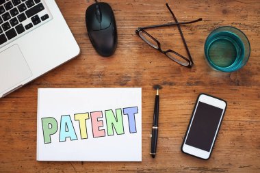 patent, kavram Not işareti kağıtta yazılı