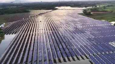 aerial view of solar energy panels in the water 