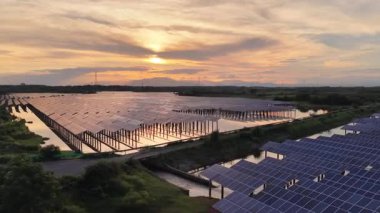 aerial view of solar energy panels in the water 