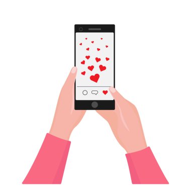 Kalpli akıllı telefonu tutan eller. Sevgi ve beğeni gönderin