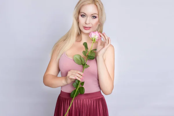 Cute Young Blonde Woman Holding Pink Rose — Stock Photo, Image