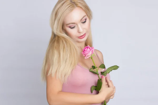 Cute Young Blonde Woman Holding Pink Rose — Stock Photo, Image