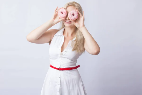 Young Blonde Woman White Dress Holds Hands Pink Donut Frosting — Stock Photo, Image