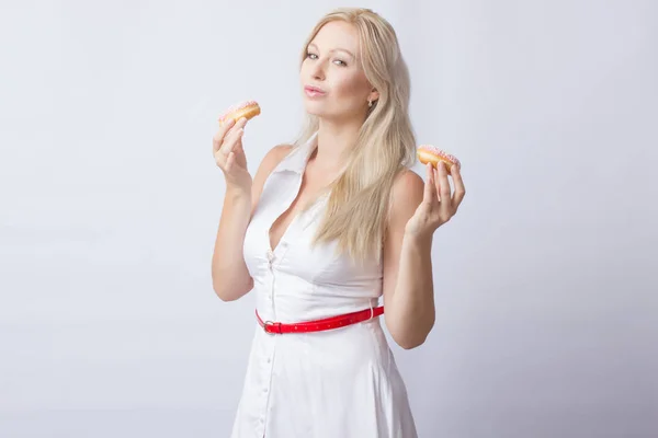 Young Blonde Woman White Dress Holds Hands Pink Donut Frosting — Stock Photo, Image