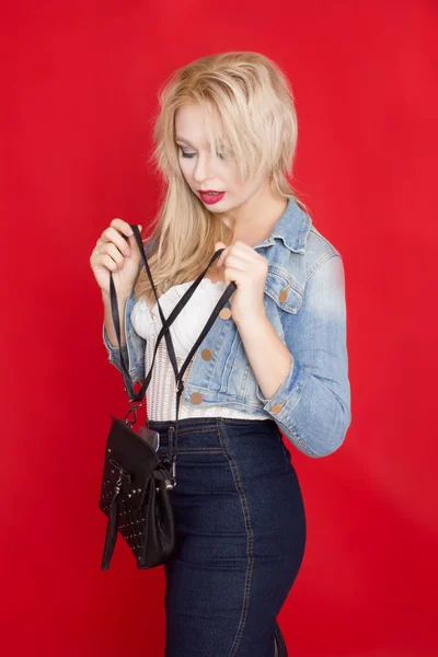 Sexy Blonde Woman Jeans Skirt Jacket Posing Red Background Black — Stock Photo, Image